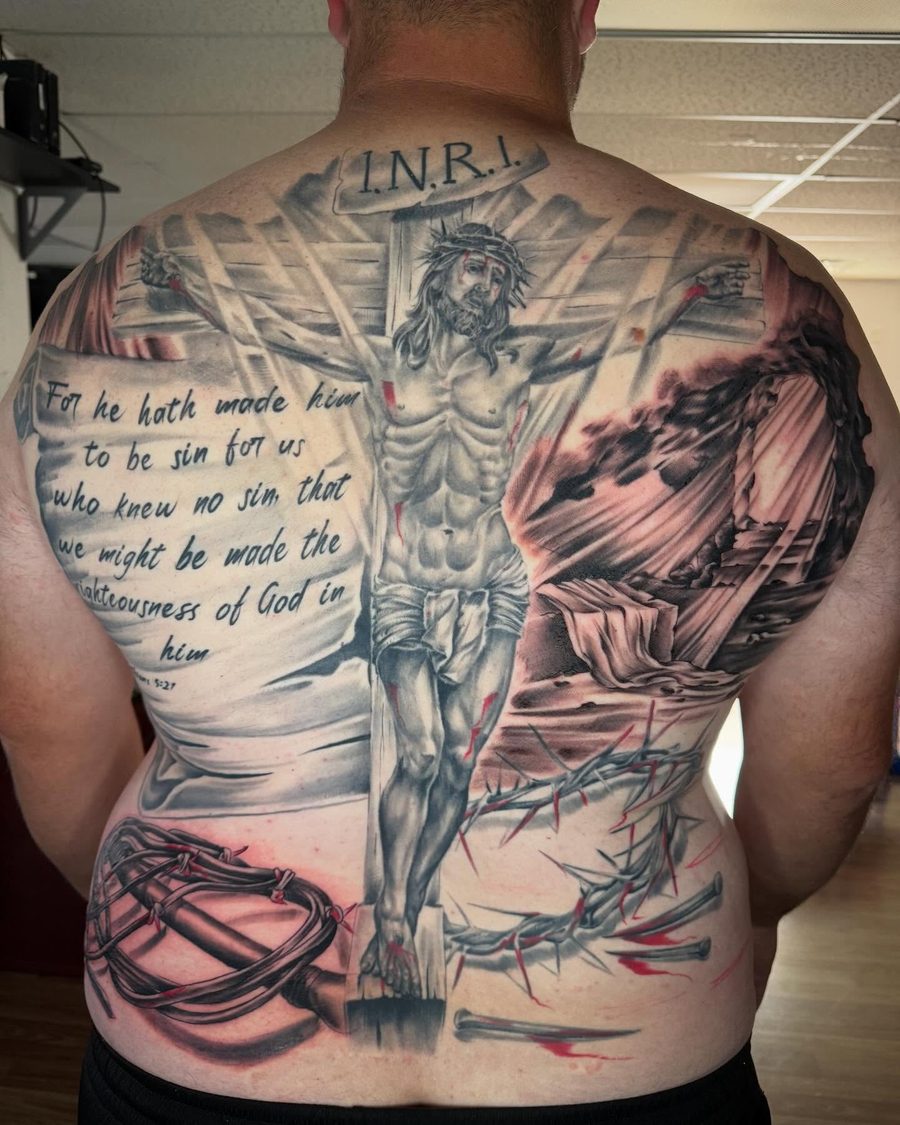 Crucifixion back piece tattoo in black and grey by Jeremy Sramek