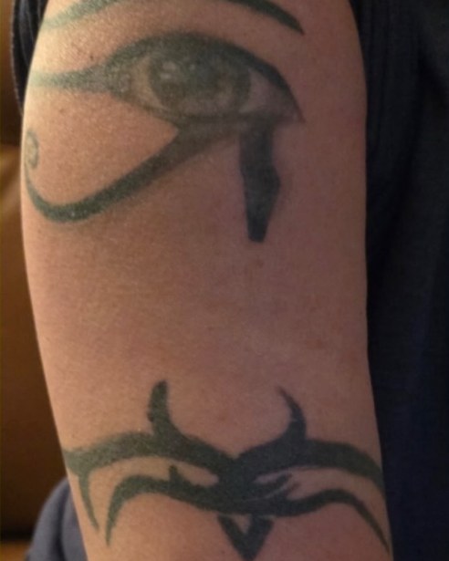 Before: the old tattoos the cover-up replaced