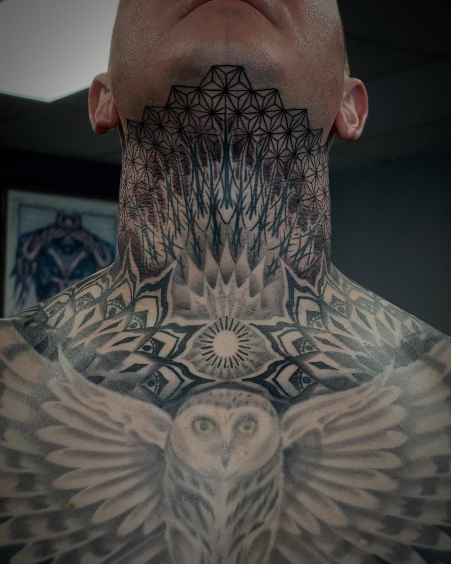 Owl and sacred geometry throat and chest tattoo by Jeremy Sramek