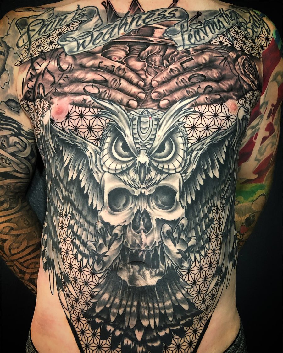 Owl, skull and flower of life blackwork chest tattoo by Jeremy Sramek