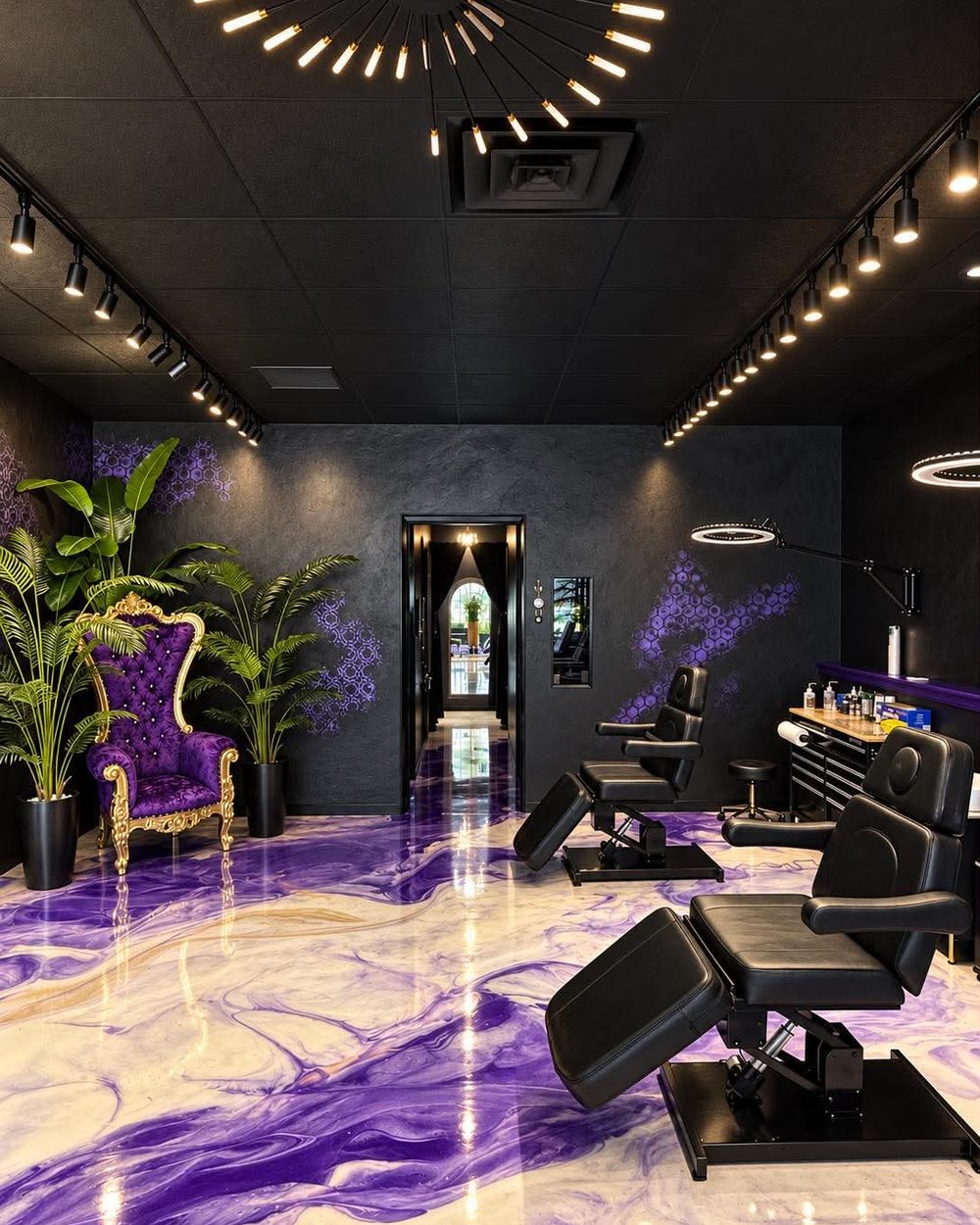 The main floor at Vanity Ink in Wheat Ridge: the purple throne, the tattoo chairs and the lit arch at the back