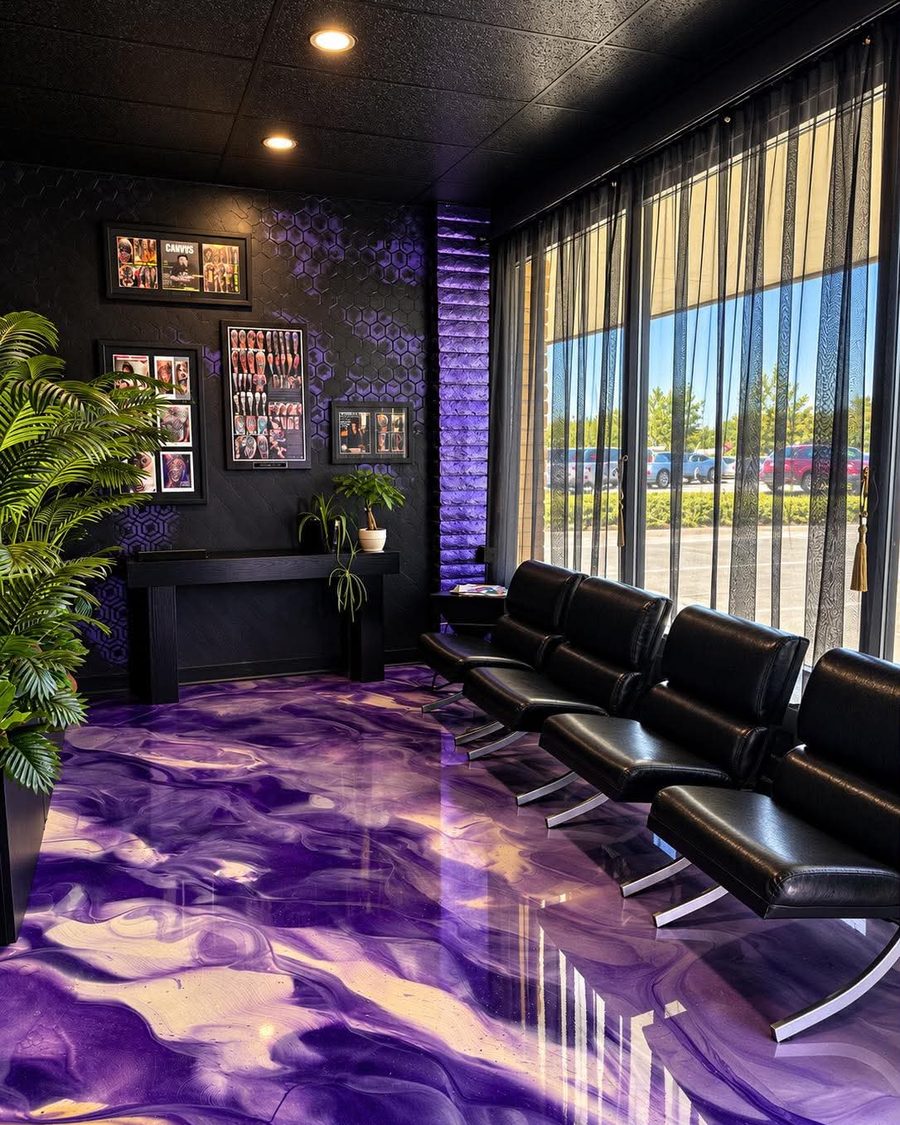 The waiting area at Vanity Ink in Wheat Ridge: leather benches by the front windows